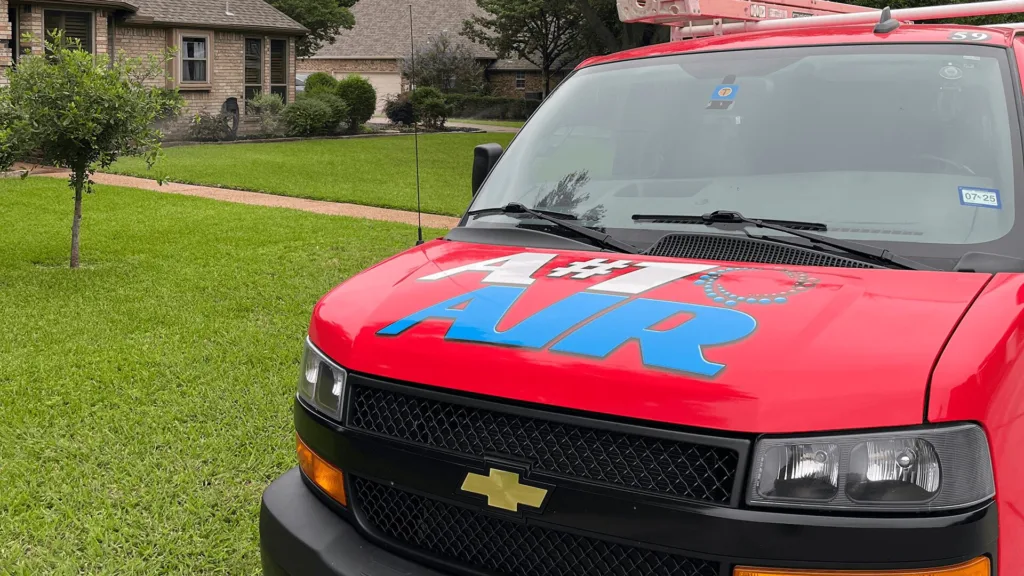 24/7 Emergency Heating Repair in Dallas-Fort Worth A#1 Air red service van parked in a Dallas neighborhood—on-site for emergency heating repair