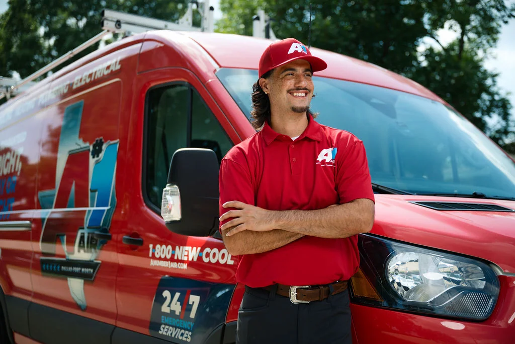 A tech leaning on the A#1 van